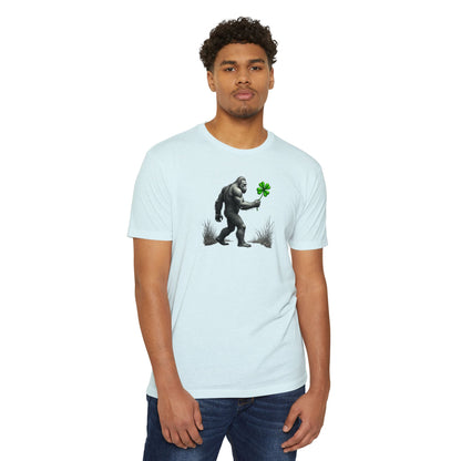 Bigfoot Holding Clover T‑Shirt — Funny Sasquatch St. Patrick’s Day Tee