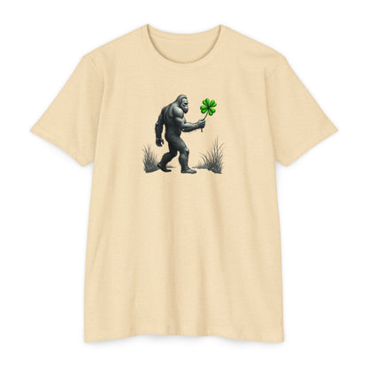 Bigfoot Holding Clover T‑Shirt — Funny Sasquatch St. Patrick’s Day Tee