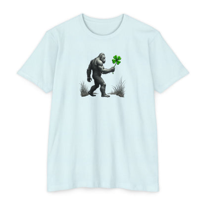 Bigfoot Holding Clover T‑Shirt — Funny Sasquatch St. Patrick’s Day Tee