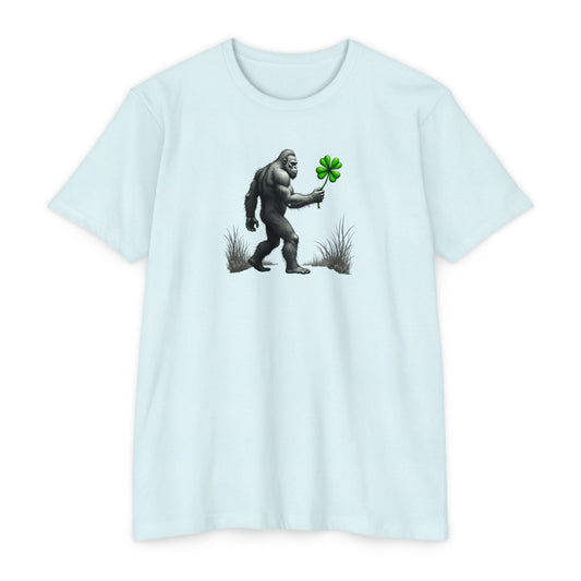 Bigfoot Holding Clover T‑Shirt — Funny Sasquatch St. Patrick’s Day Tee